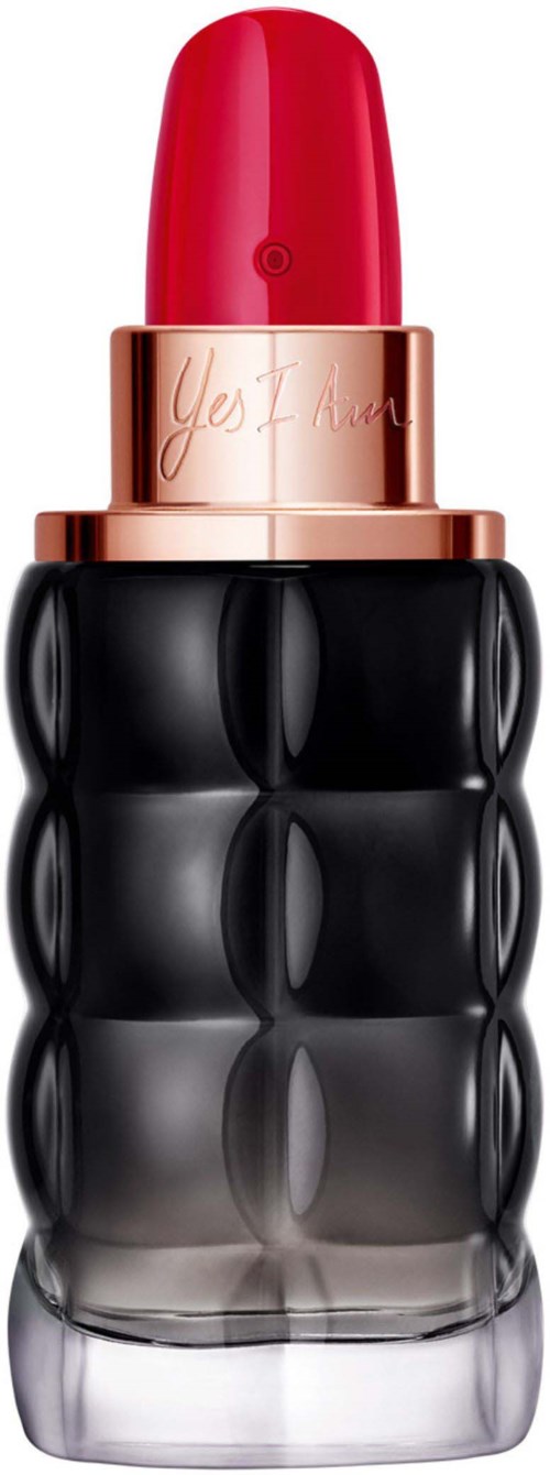 A lipstick with a black, bubble-like textured case and a red cap, labeled Yes I Am.