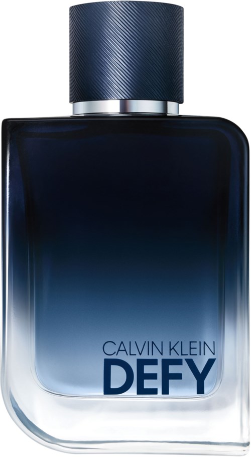 Een blauw-gradient parfumfles met een donkerblauwe dop, gelabeld 'Calvin Klein DEFY'.