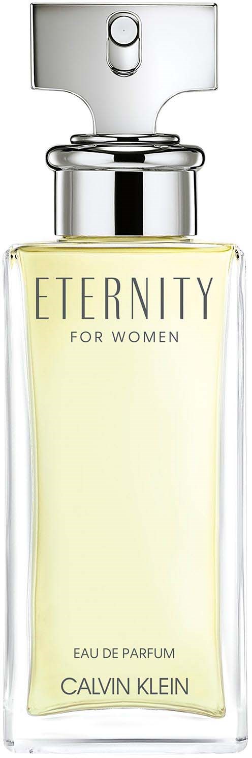 Een heldere parfumfles met zilveren dop, gemarkeerd 'Eternity for Women' door Calvin Klein.