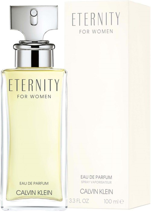 Een parfumfles met de tekst "Eternity for Women" naast zijn doos, met lichtgele vloeistof binnen.