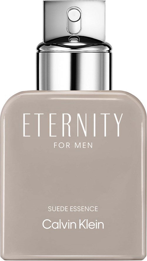 En flaske av Eternity for Men Suede Essence parfyme av Calvin Klein med sølvhette og beige etikett.