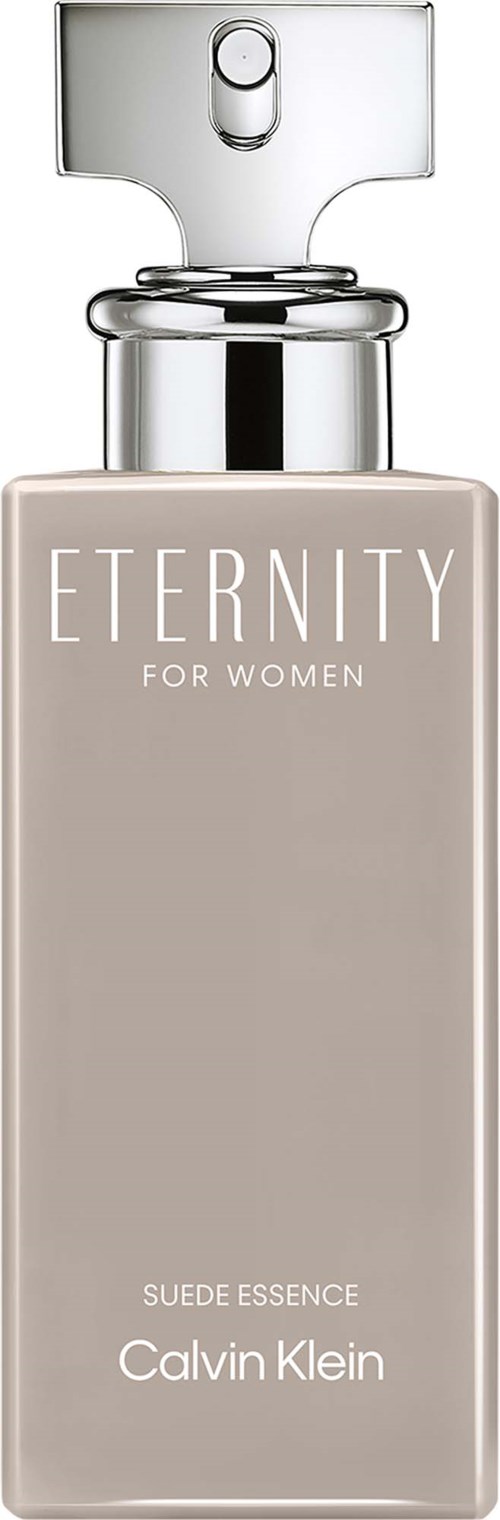En beige flaske av Eternity for Women Suede Essence parfyme av Calvin Klein med en sølv spraykopp.