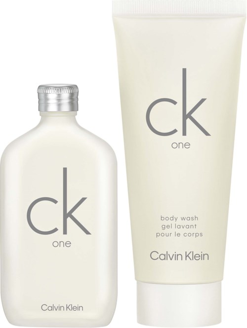 A Calvin Klein CK One body wash in a white bottle and a matching tube with gray text.