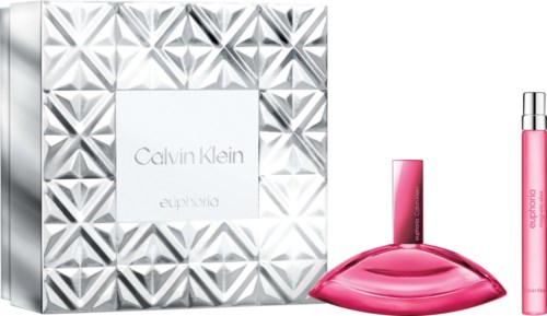 Calvin Klein Euphoric perfume bottle and a pink and purple lipstick tube next to a white Calvin Klein box with a geometric pattern.