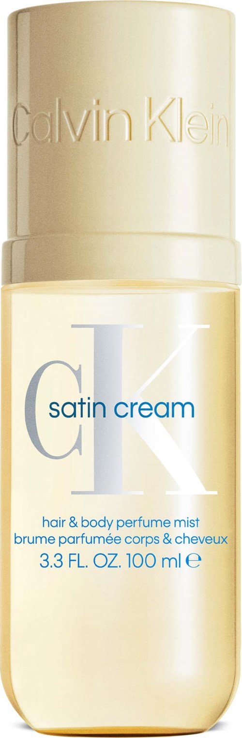 En flaska Calvin Klein satin cream doftspray för hår och kropp med beige lock och ljus kropp.