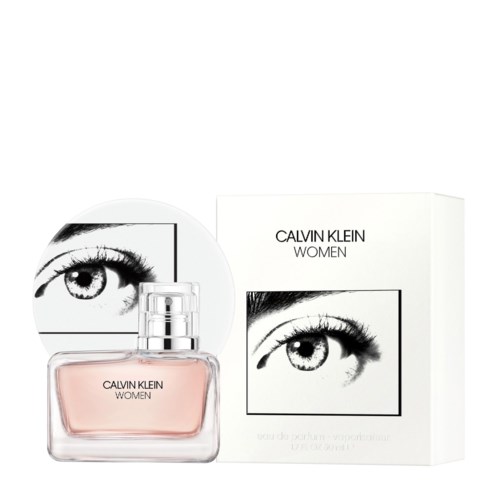 Een parfumflesje en doos met zwart-wit oogillustratie en de tekst 'Calvin Klein Women'.