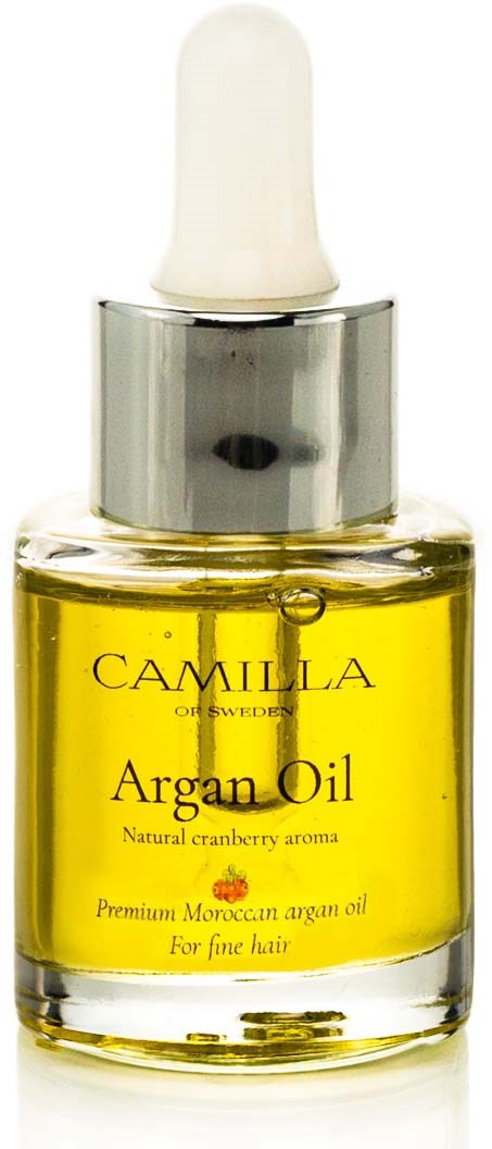 Pieni pullo Camilla Argan Oil -tuotetta, tipulla, keltainen öljy ja etiketti, jossa lukee luonnollinen karpalotuoksu.