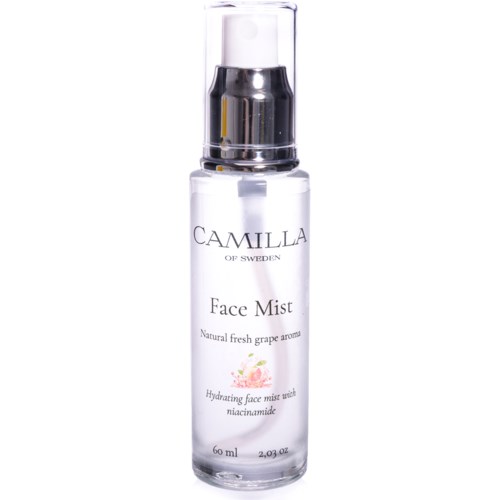 Eine klare Sprühflasche mit 'Face Mist' Beschriftung, enthält eine feuchtigkeitsspendende Gesichtsnylonspray mit Traubenaroma.