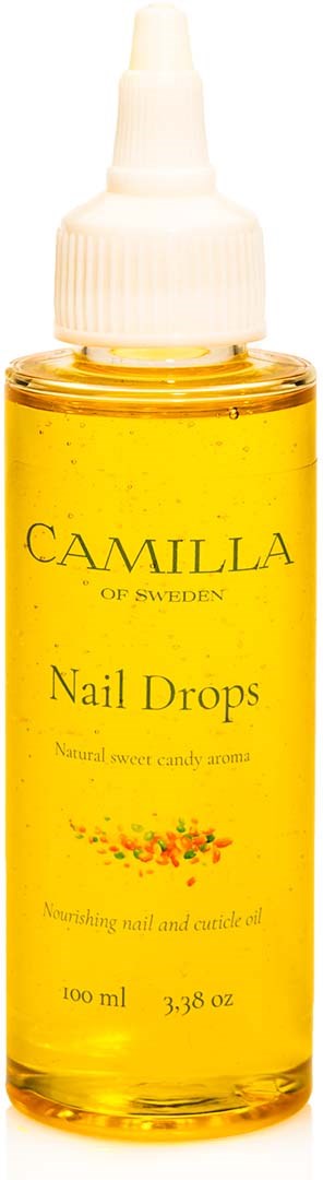 En liten gul flaska märkt 'Camilla of Sweden Nail Drops' med vit lock och pipett. Innehåller 100 ml vätska.