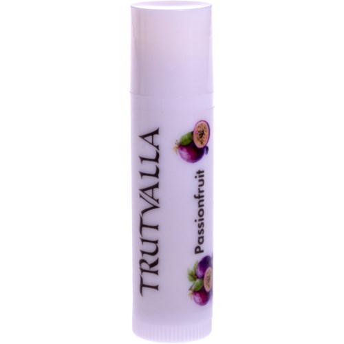A white lip balm tube with passionfruit images and the word "TRUTNAULA" on it.