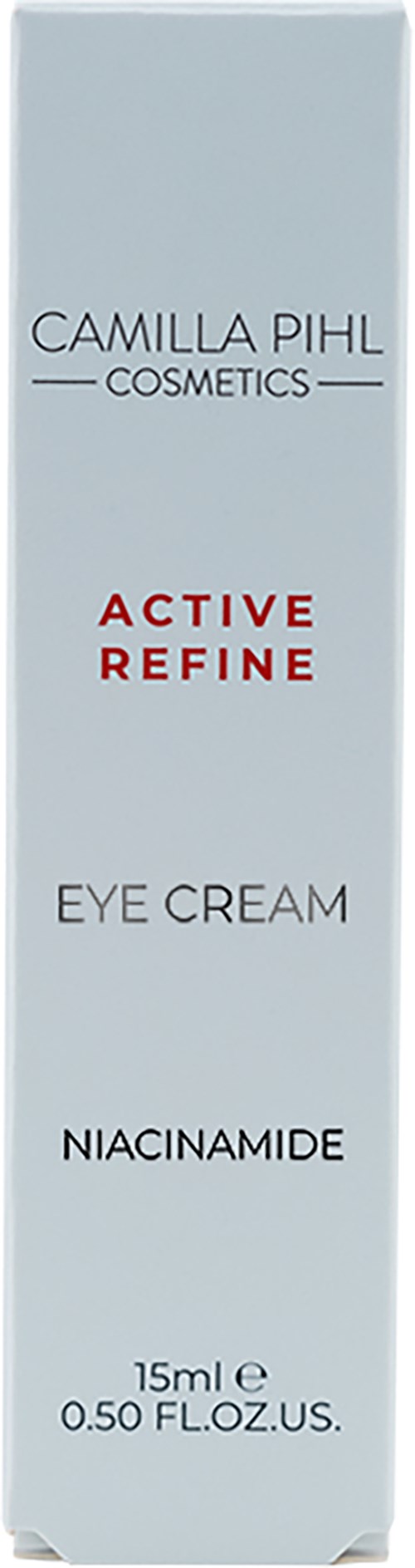Een lichtblauwe doos met oogcrème door Camilla Pihl Cosmetics, gemarkeerd als 'Active Refine' met niacinamide, 15 ml.