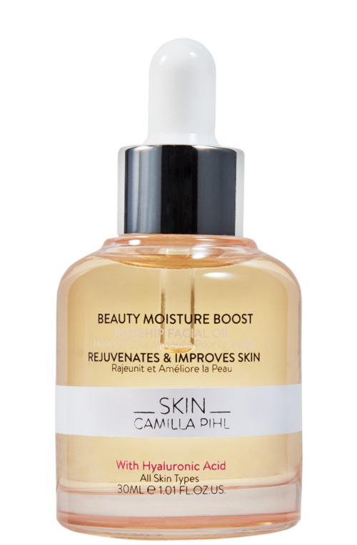 Ihohoitotuotteiden pullo, jossa lukee 'Beauty Moisture Boost' ja valkoinen tiputin.