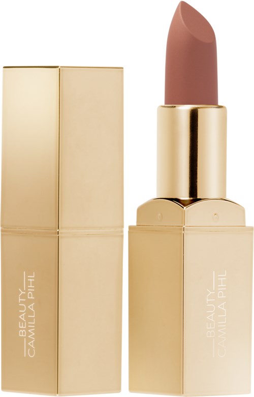 A beige lipstick in a shiny gold case with a matching gold cap, standing upright.