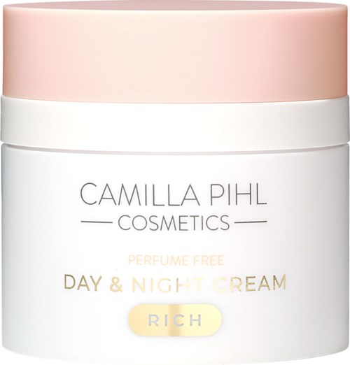 Witte pot met roze deksel, gelabeld Camilla Pihl Cosmetics Dag- en Nachtcrème, Rijk, parfumvrij.