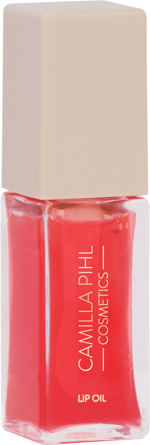 Rotes Lippenöl in einer durchsichtigen Flasche mit weißem Deckel, markiert "Camilla Phil Cosmetics."
