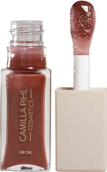 Lippenöl oder Lipgloss in einer klaren Flasche mit hellrosa Farbe und Applikator mit Wattestäbchen.