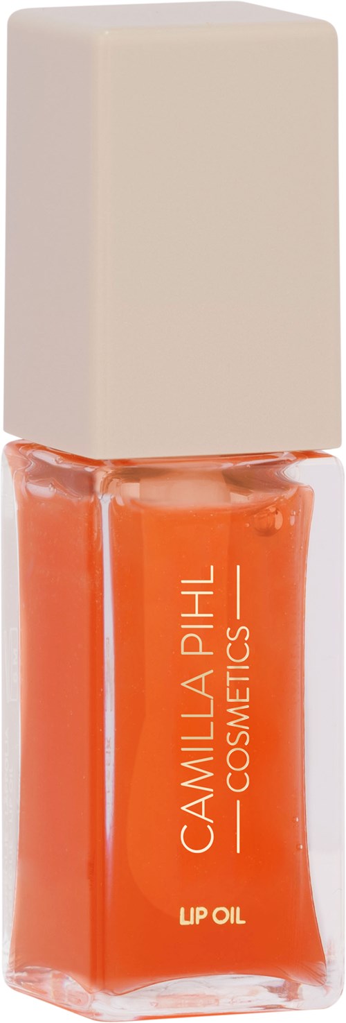 Kleine flesje met oranje lipolij van Camilla Phil Cosmetics met witte dop.
