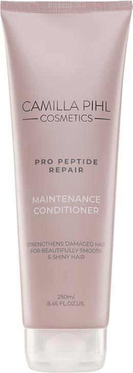 A pink tube of Camilla Pihl Cosmetics Pro Peptide Repair Maintenance Conditioner, 250ml, for strong and shiny hair.