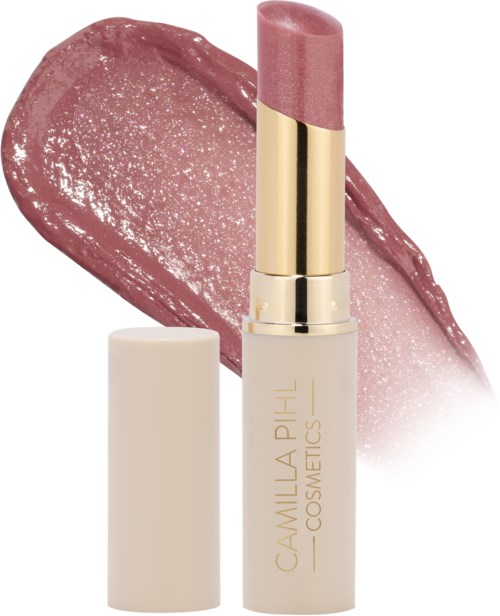 Een roze lippenstift met een glanzende, glinsterende vlek achter zich op een witte achtergrond.