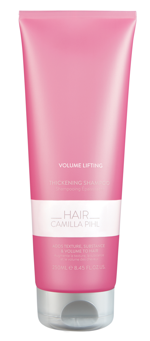 Roze tube haarverstevigende shampoo met witte label, bevordert volume.
