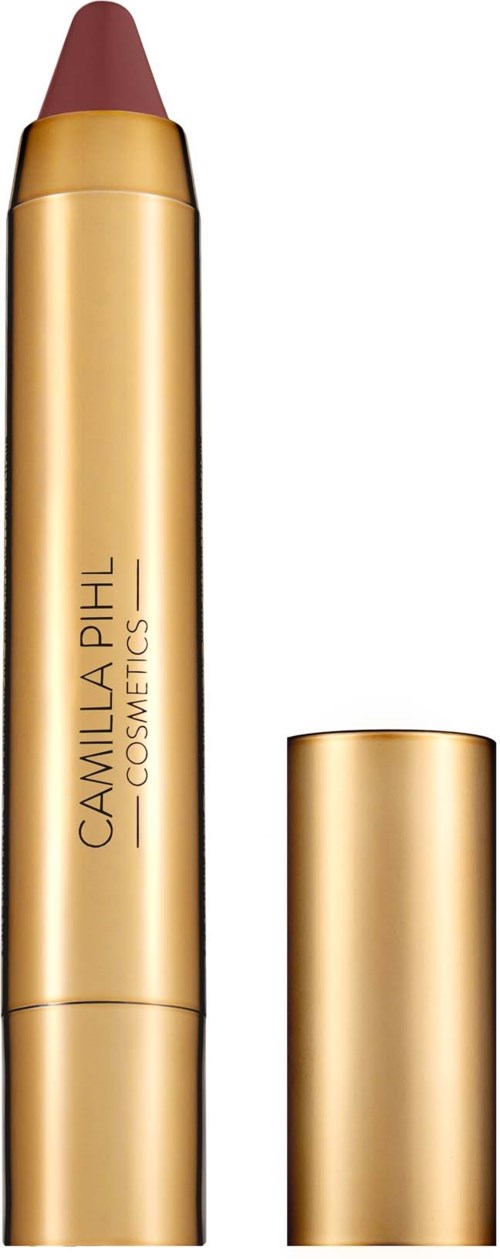 En gullfarget leppestiftkopp med merking Camilla Pihl Cosmetics og avtakbar hette.