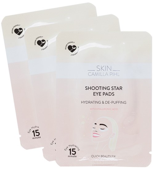 Drie verpakkingen huidverzorgings-oogpads met 'Shooting Star Eye Pads' label, met illustratie van een gezichtengel, hydraterend en 15 minuten gebruik.
