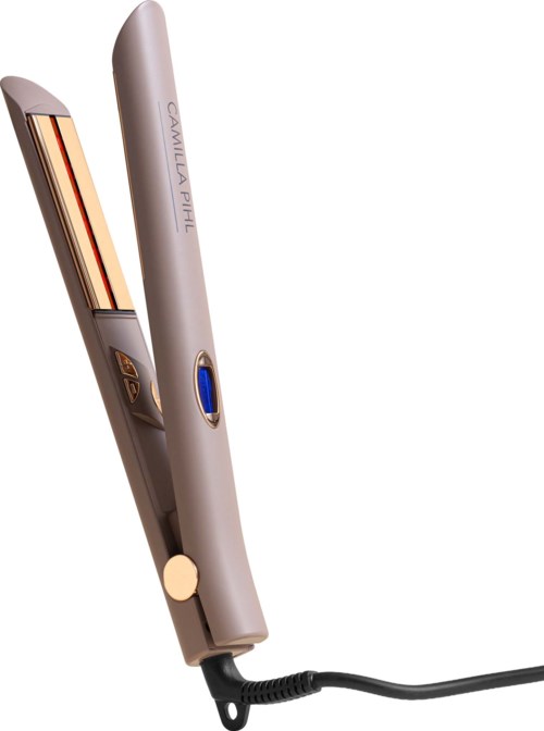 A hair straightener with pink and gold parts and a black cord.