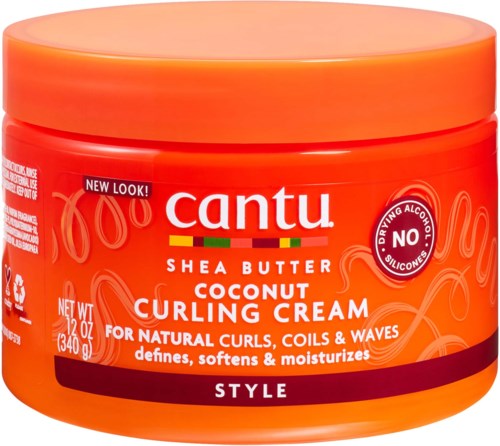 Cantu kokos krullenkrem in een oranje pot, belooft krullen te definiëren en zacht te maken zonder alcohol of siliconen.