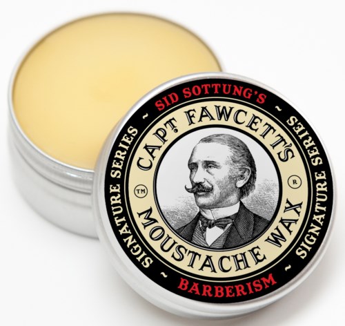 A round container with a lid showing a man's face and text about a mustache wax for barber use.