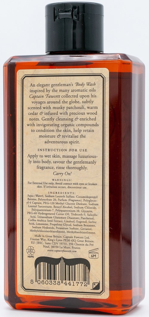 A bottle with a beige label and black cap. It describes a men's body wash with a masculine scent.