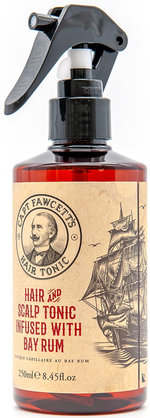 En sprayflaska märkt 'Cat Fawcett's Air Tonic' för hår och hårbotten, med en fartygsillustration på etiketten.