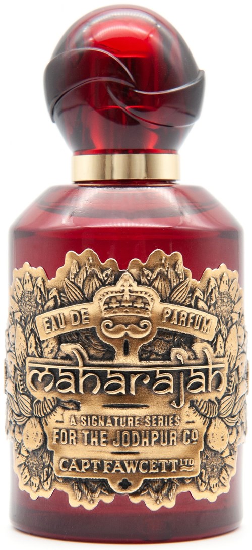 A red perfume bottle with a decorative label and a round, marbled cap.