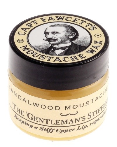 A jar of moustache wax with a black lid showing a man with a mustache and the brand name, Cape Fawcett's.