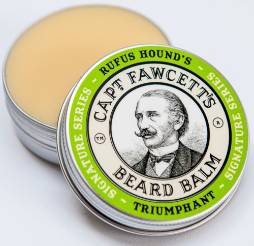 En rund burk med skäggbalsam med etikett som visar ett mansporträtt och grönt kantband. Märke: Captain Fawcett's.