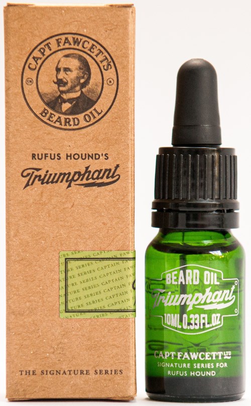 A small green bottle of beard oil with a black dropper and a brown box labeled 'Captain Fawcett's Beard Oil' and 'Triumphant.'