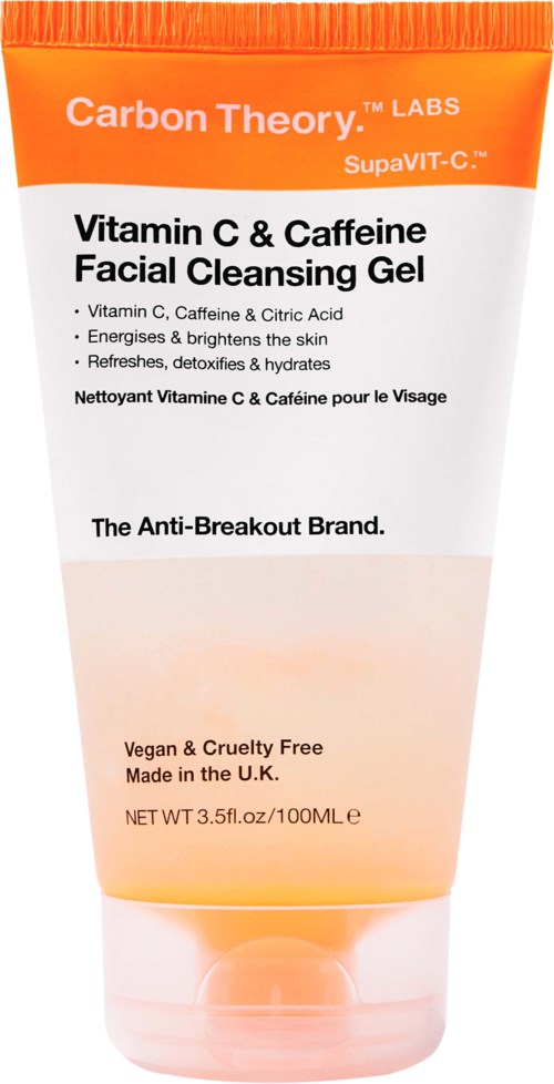 Een tube gezichtsreinigingsgel, oranje en wit, met tekst over vitamine C, cafeïne en huidvoordelen.