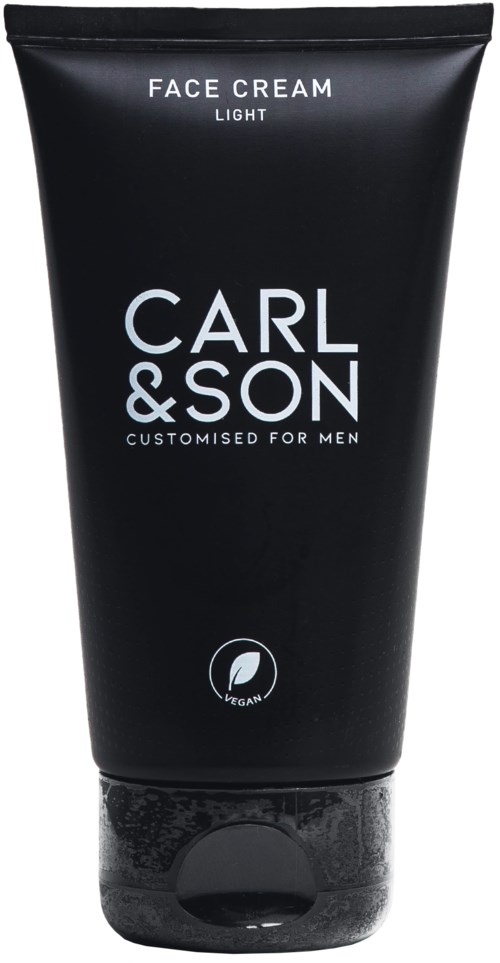 A black tube with white text, labeled 'Face Cream Light' by Carl & Son for men, vegan product.