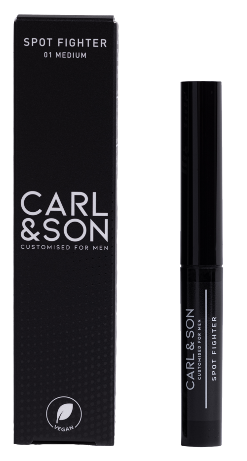 A black box and a black tube of men's deodorant named Carl & Son, labeled 'Spot Fighter' in medium size.