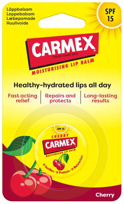 Jasnożółty opakowanie Carmex balsamu do ust z wiśniami, liściem i tekstem chroniącym zdrowe usta.