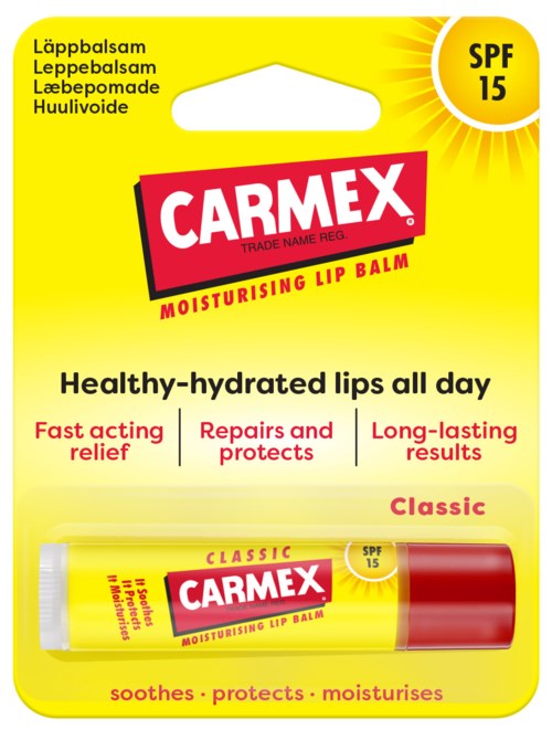 Balsam do ust Carmex w żółtej tubce z czerwonym kapslem i SPF 15, opisywany jako nawilżający, łagodzący i chroniący.