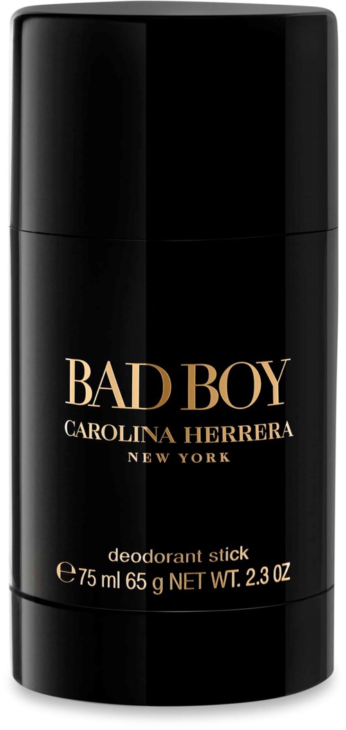 En svart deodorantstiftbehållare med guldfärgad och vit text, märkt 'BAD BOY' av Carolina Herrera, New York.