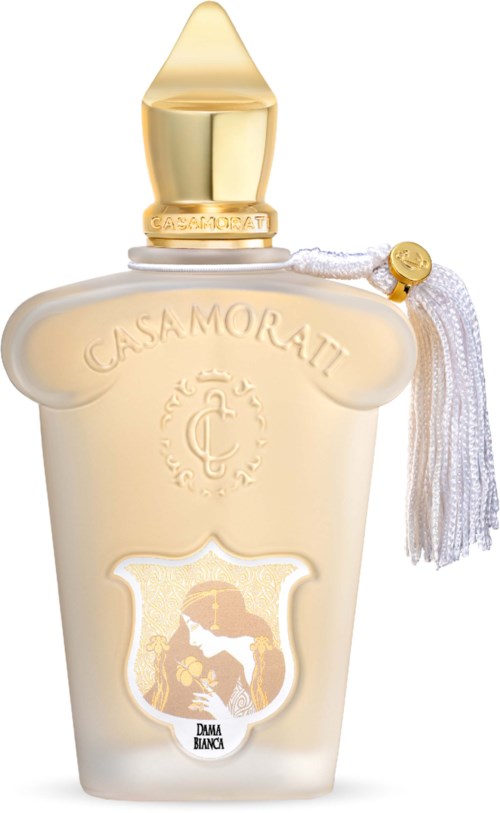 Een parfumfles met een gouden dop, witte kwast en een label met een paard en een vrouw.