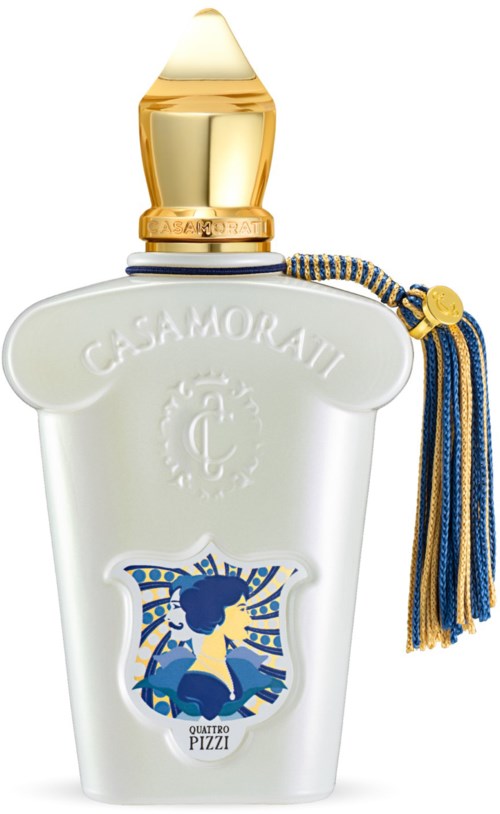 A white perfume bottle with a gold cap and a blue-and-gold tassel. It has a logo with a woman and the text "Quattro Pizzi."
