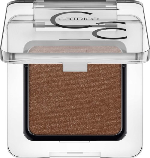 A square, transparent compact with a brown eyeshadow and a clear lid with black text and design.