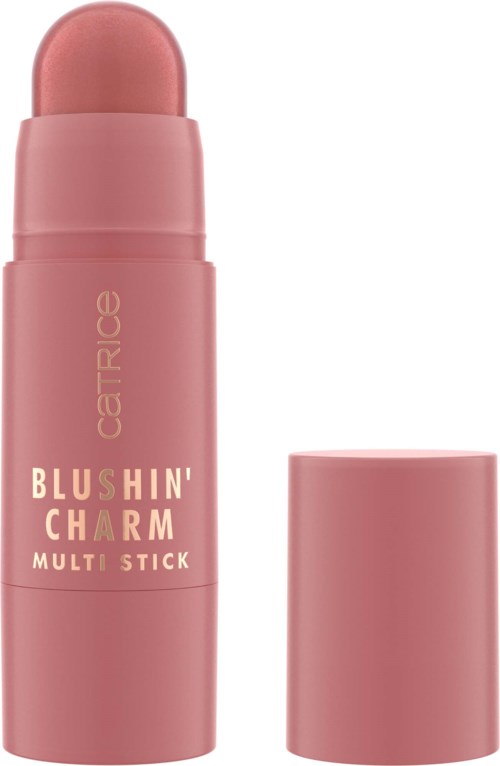 A pink makeup stick with a rounded top and a separate cap, labeled "Blushin' Charm" by Catrice.