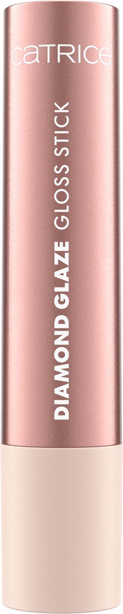 A pink tube labeled 'Catrice Diamond Glaze Gloss Stick' stands vertically with a black background.
