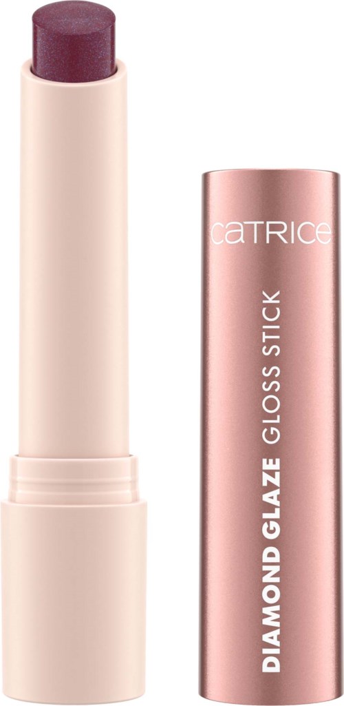 A lipstick with a purple shade and a rose gold container labeled 'Catrice Diamond Glaze Gloss Stick'.