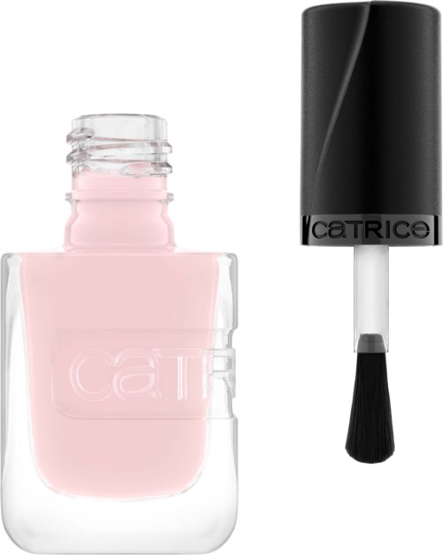 Ett litet rosa nagellack flaskan och en svart nagellackborste med lock bredvid.