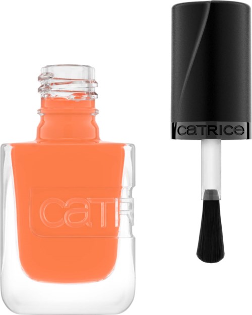 Nail polish in orange color with a black brush applicator next to it.