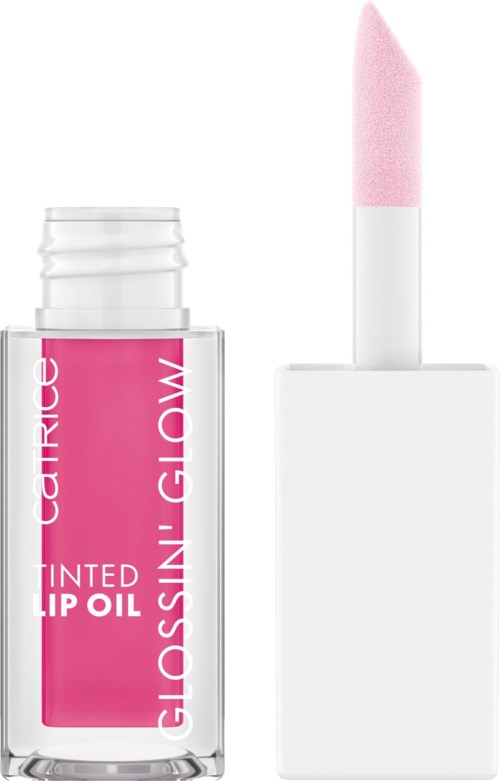 Läppolja i rosa i en genomskinlig flaska med vit och rosa text, med en rosa applikator på vit lock.